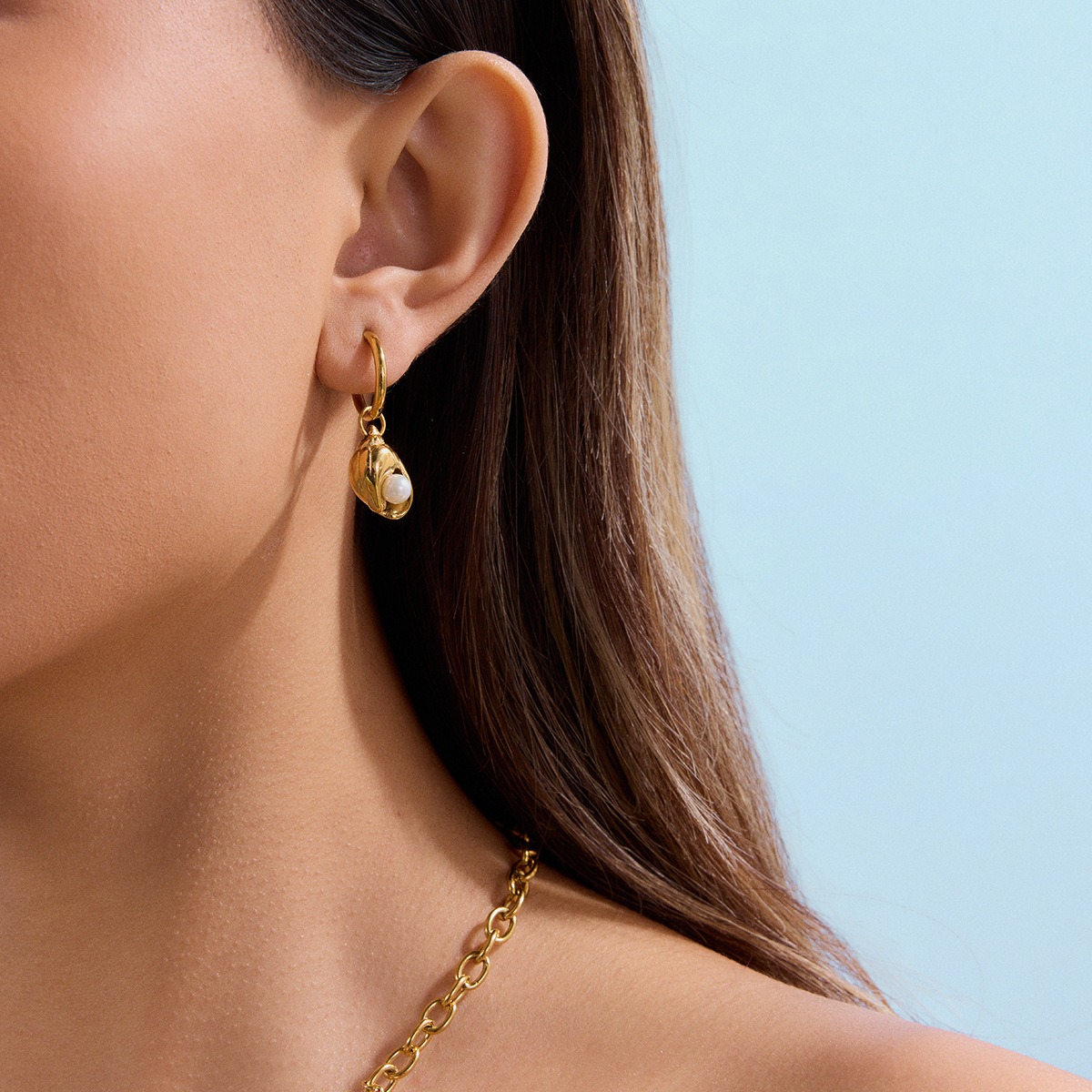 Exquisite Ohrringe im Ozean-Stil mit Seestern- und Muschelmotiv aus 18-karätigem Gold – Bild 5